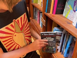 Taking book from shelf